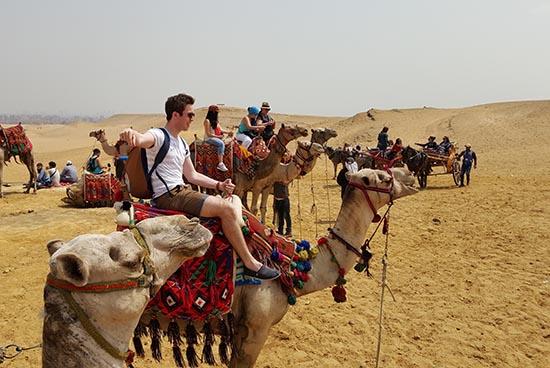 A camel ride amomngst the pyramids in Ancient Egypt